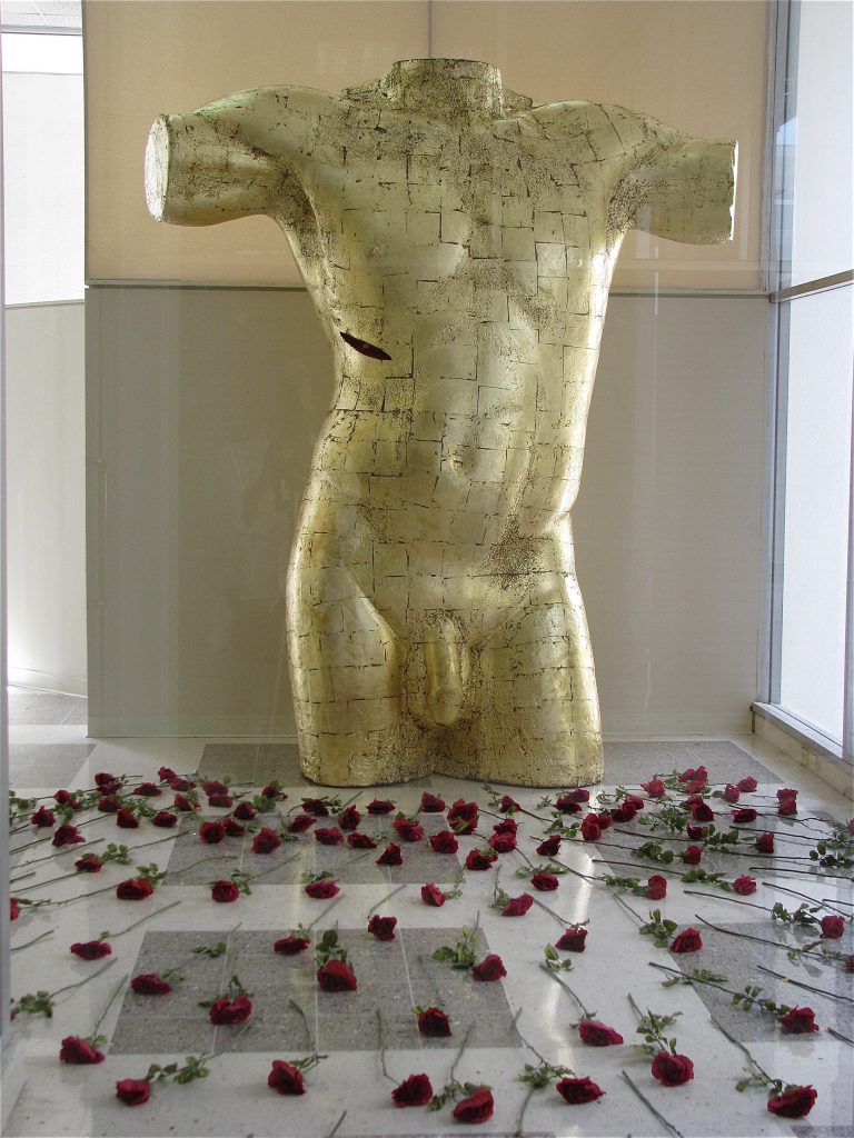BODY AND BLOOD, 2004, imitation gold leaf, styrofoam, roses, 10’