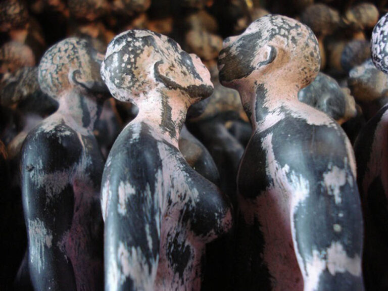 THEIR SPIRITS GONE BEFORE THEM, detail, 2006, cottonwood canoe, 16’; 1357 resin figures, sugar cane