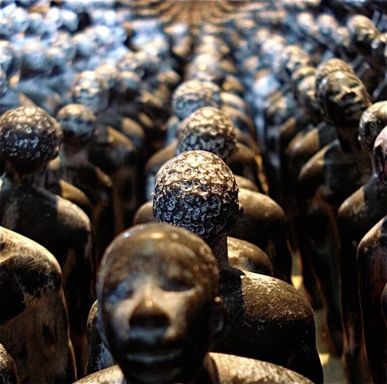THEIR SPIRITS GONE BEFORE THEM, detail, 2006, cottonwood canoe, 16’; 1357 resin figures, sugar cane