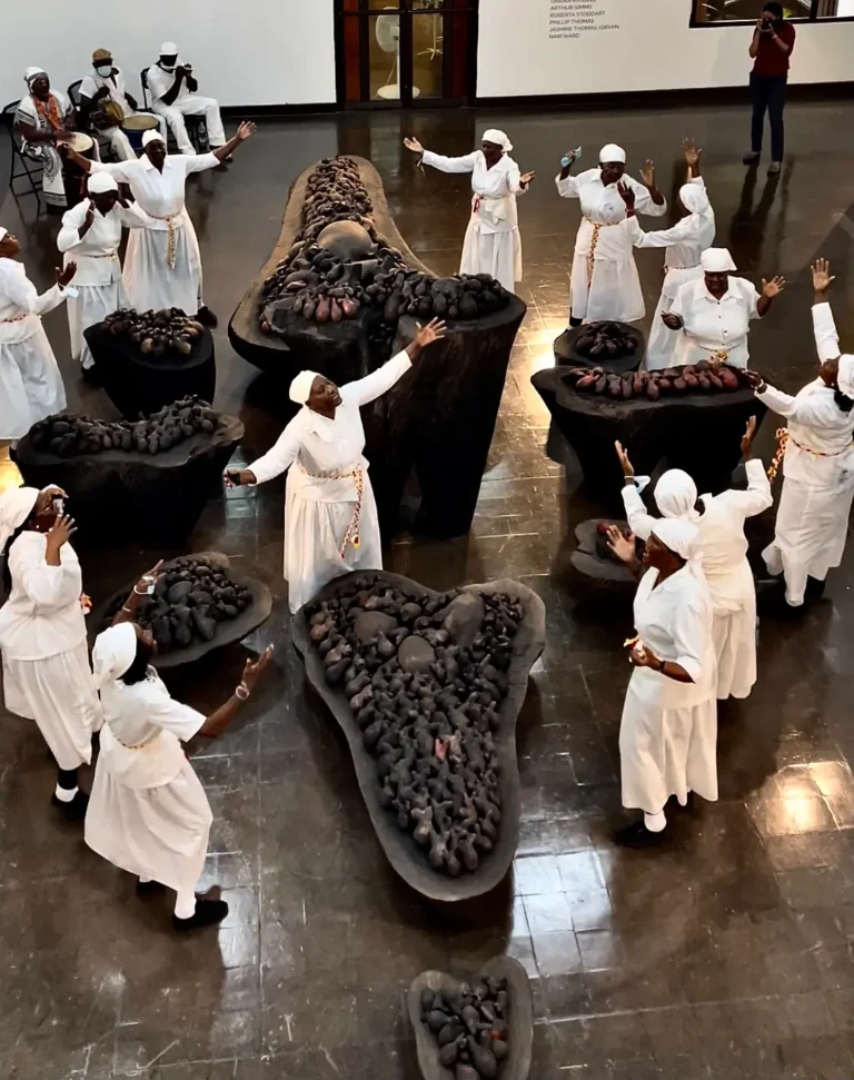 Melda and group at the National Gallery of Jamaica in 2022, sanctifying Laura's work, Guide Their Way Home